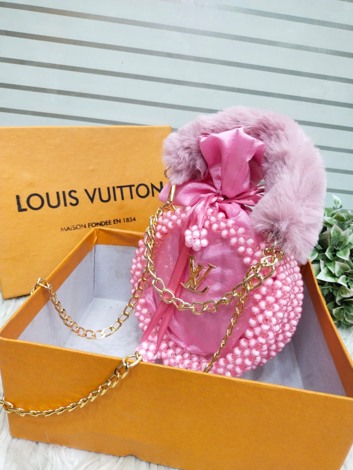 Luxurious LV Crossbody Bag with Pearl Detailing