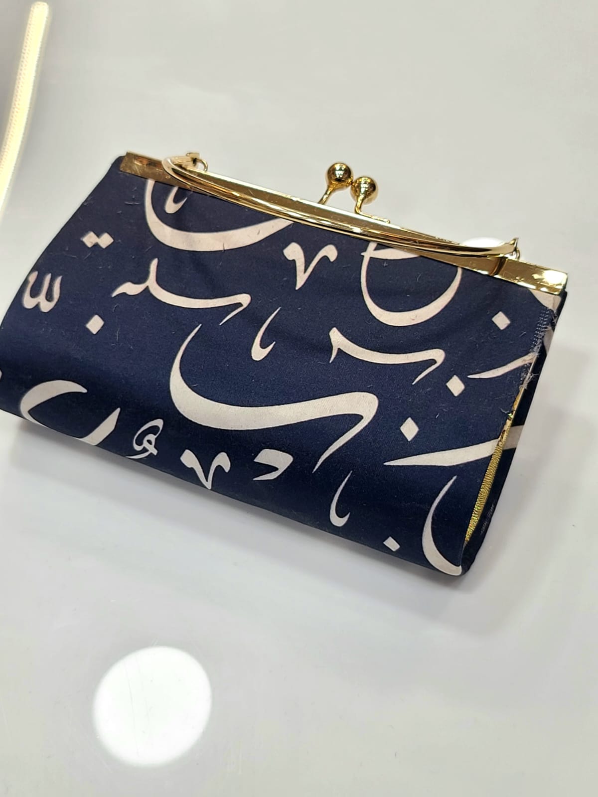 Calligraphy Print Satin Clutch with Gold Frame