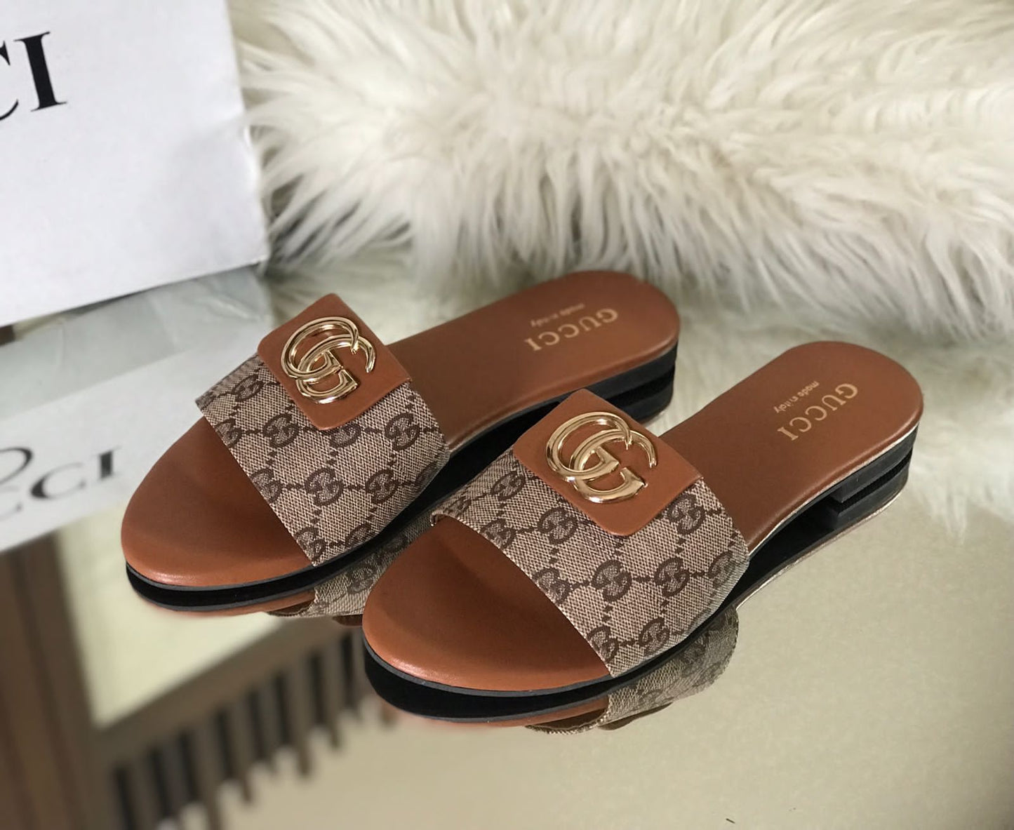 GUCCI Monogram Slip-Ons with Gold Logo Detail