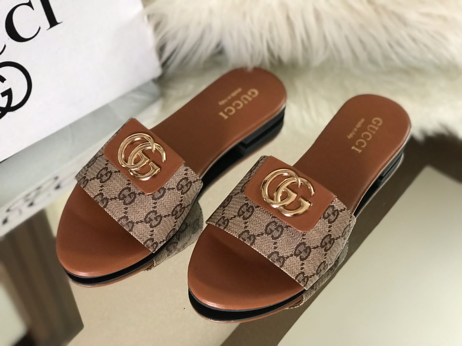 GUCCI Monogram Slip-Ons with Gold Logo Detail