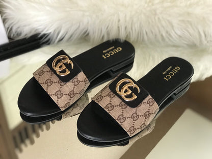 GUCCI Monogram Slip-Ons with Gold Logo Detail