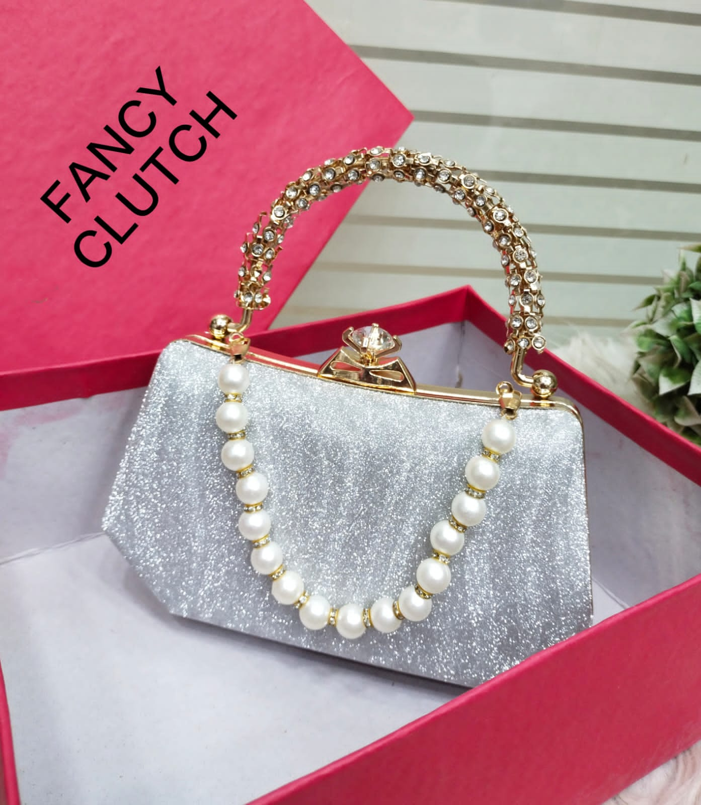 Elegant Fancy Clutch with Gemstone Handle