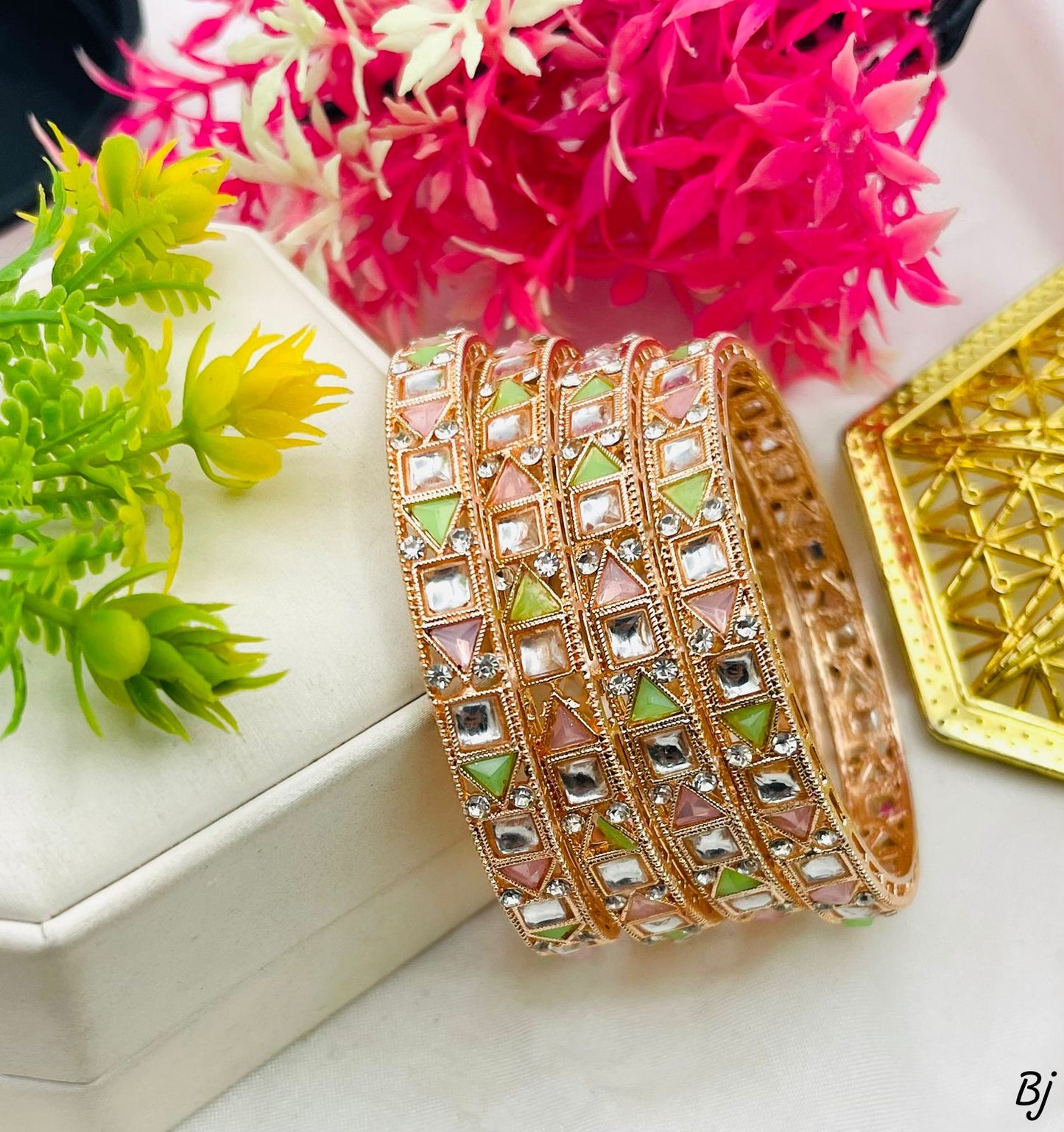 Elegant Gold Bangles with Gemstones