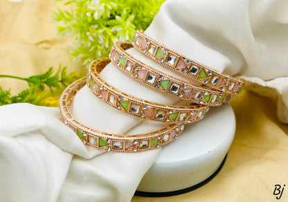 Elegant Gold Bangles with Gemstones