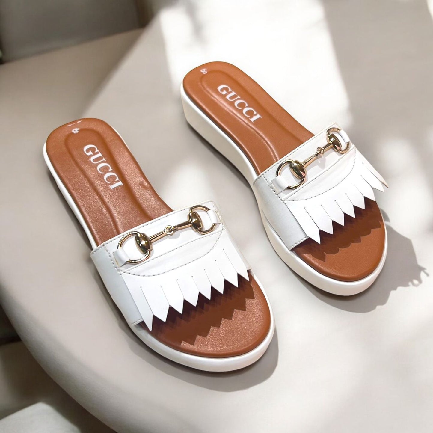 GUCCI Fringe Detail Slip-Ons with Gold Hardware